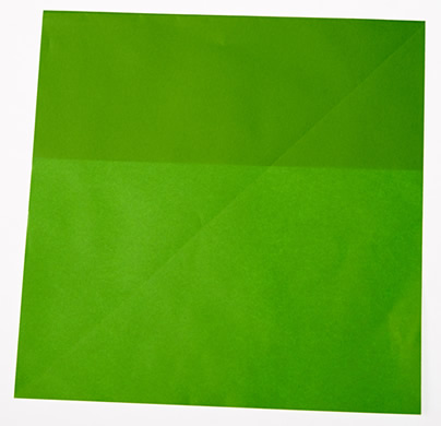 Grønt ark med prett øverst på arket