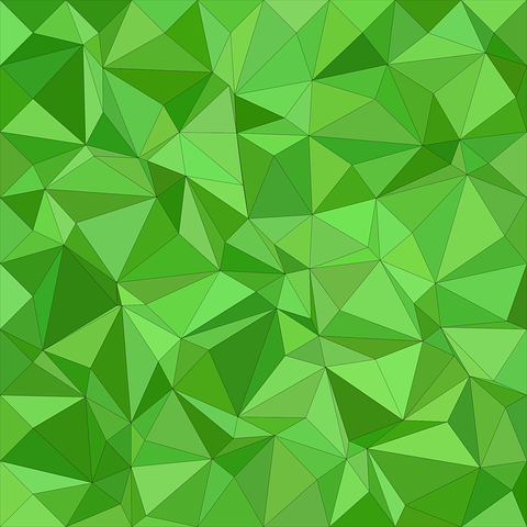 Mange trekanter på grønn bakgrunn