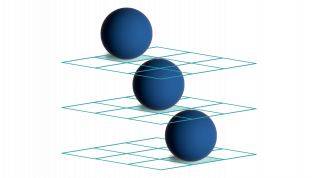 Tre kuler plassert diagonalt i en gjennomsiktig boks.